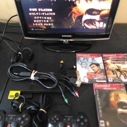 PS2 Slim w/ 3 games