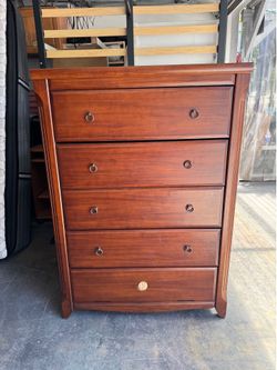Newer mahogany stained solid wood, tall 5- drawer dresser