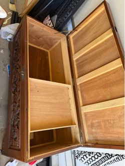 Glass top hand-carved Chinese camphor wood chest