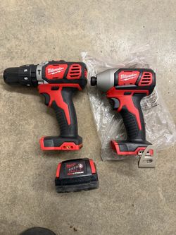 Brand new Milwaukee  m18 impact and drill w/ battery
