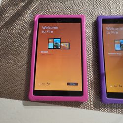 Two Amazon 7 Inch Tablets