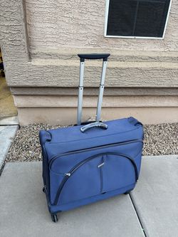 Samsonite Blue rolling garment bag suitcase