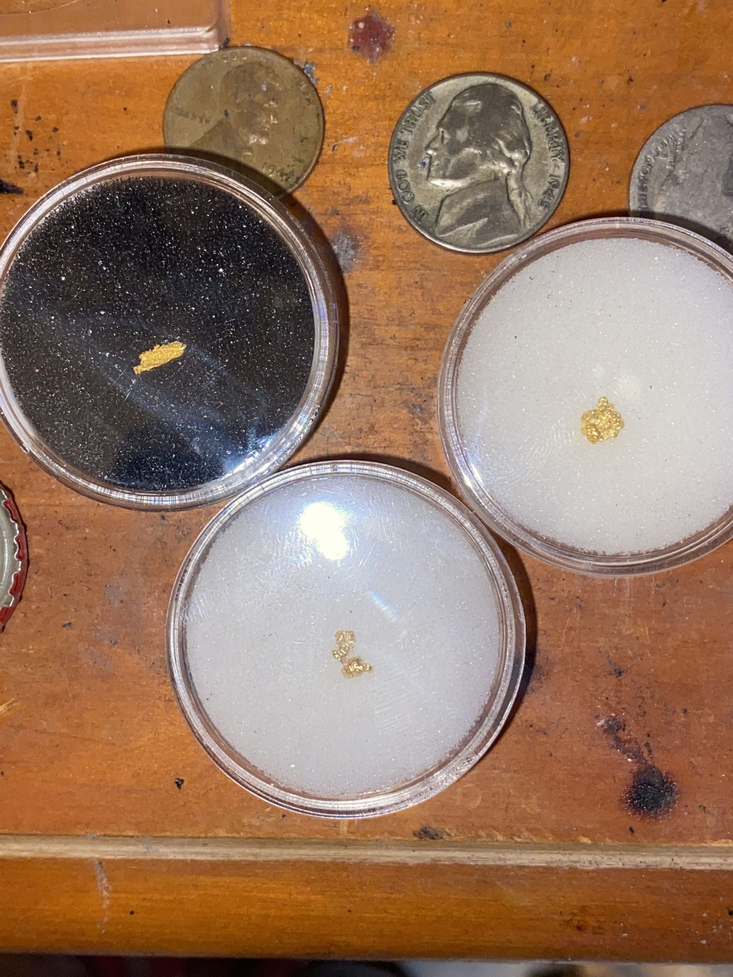 Three small golden nuggets one of them very rare