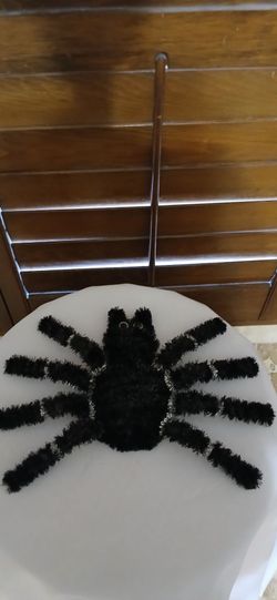 BRAND NEW HALLOWEEN LARGE BLACK SPIDER,  TWO BIG EYES WITH A SILVER TRIM AROUND  BODY AND LEGS
