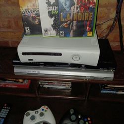 Xbox 360 game system with 2 remotes and 3 games