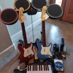 Rock Band bundle with Game System Rockband Guitar Hero
