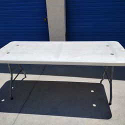 Heavy Duty Table 6 ft Leg Folding Table $60 each (Umbrella  Not Included)