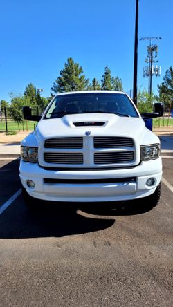 2004 Dodge Ram 2500 SLT Quad Cab, Long Bed, on the fly 4X4, 5.9 CummWell-Maintained Truck – A True Gem!
Rhino Lined bed with Solar Max
Rebuilt transmi