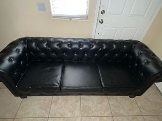 Black leather coach