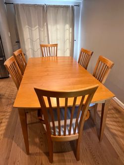 Wooden Dining Room Table (with leaf) and 6 Chairs