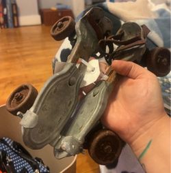Vintage Metal Roller Skates with Leather Straps