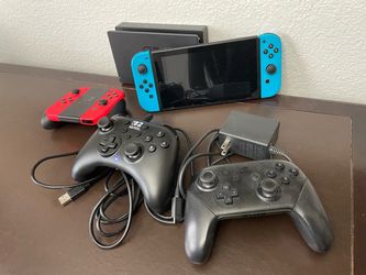 Nintendo Switch Bundle + 4 Controllers + Dock & Charger