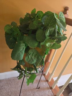 Indoor artificial plant vase with a metal stand