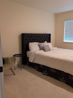 Queen bed with mattress and base