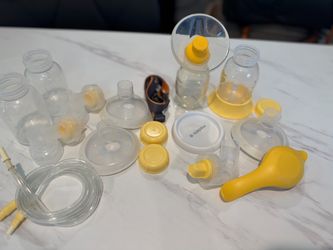 Medela Harmony Manual Breast Pump + Extra Medela Accessories