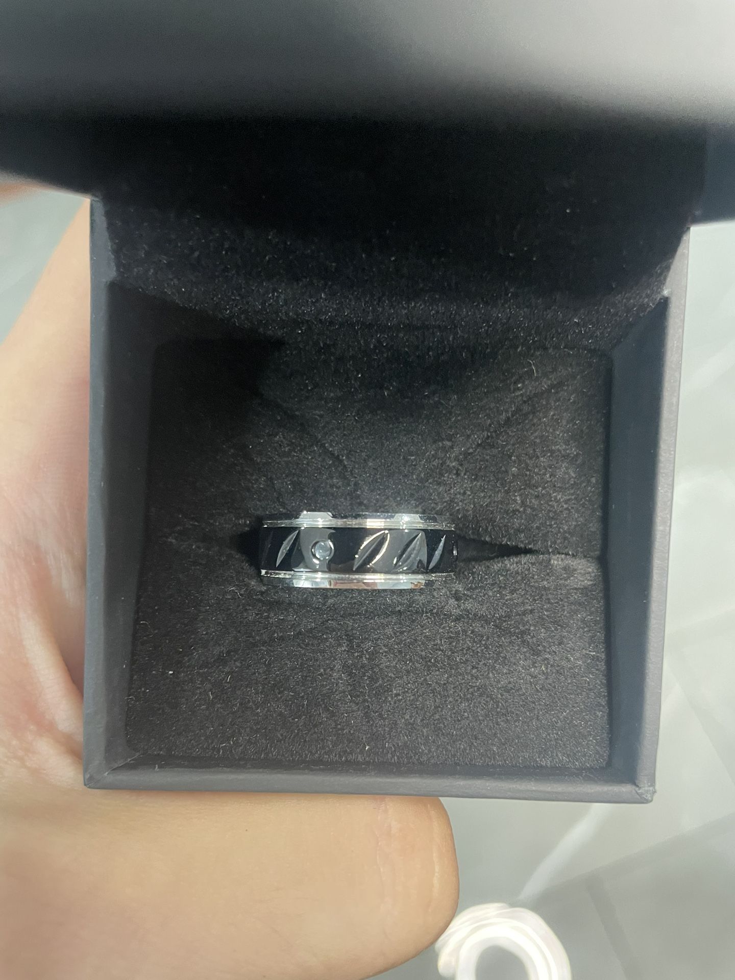 Black and stainless steel ring 