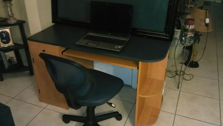 Wood Desk. Not too big to fit in home office area. Only $60 with Chair. Like new.