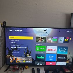 55" IN SMART TV W/ 2 REMOTES ROKU