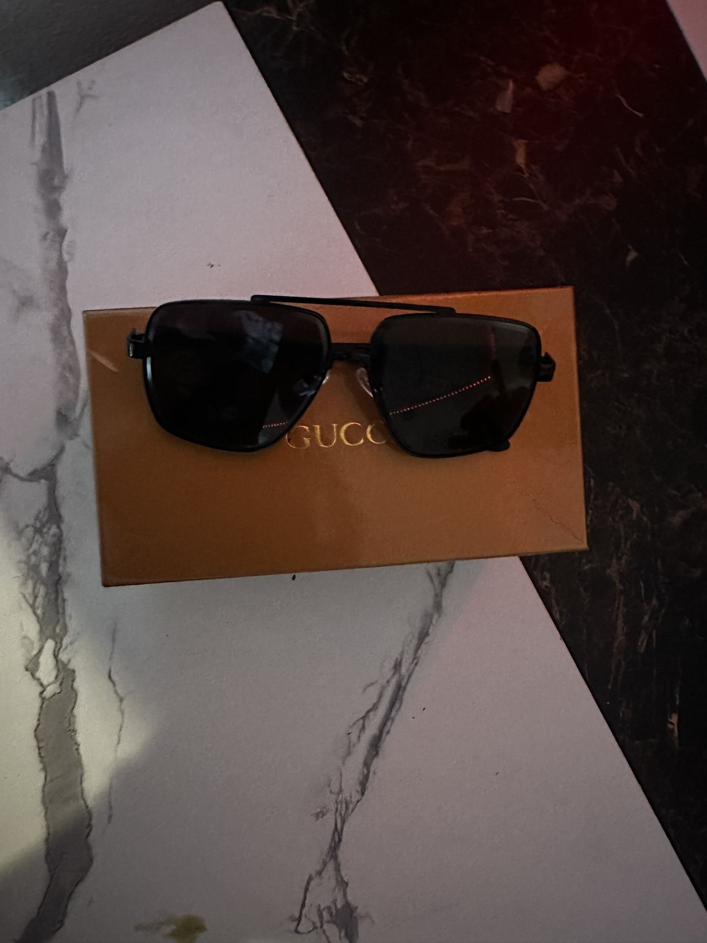 Gu€€i sunglasses