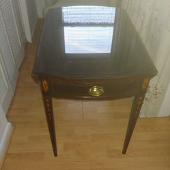 End table with glass top