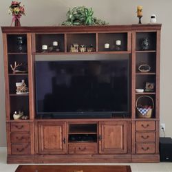 TV Entertainment  Center With 6 drawers and 2 cabinets.