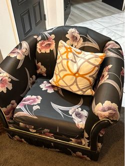 3 piece black couches with floral print!