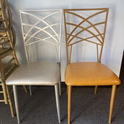 New Modern Accent Stacking Chairs – Gold & Silver, Commercial Quality  Two high-quality commercial-grade metal stacking chairs available. One gold and
