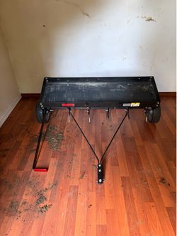 Brinley tow behind plug aerator. $125.