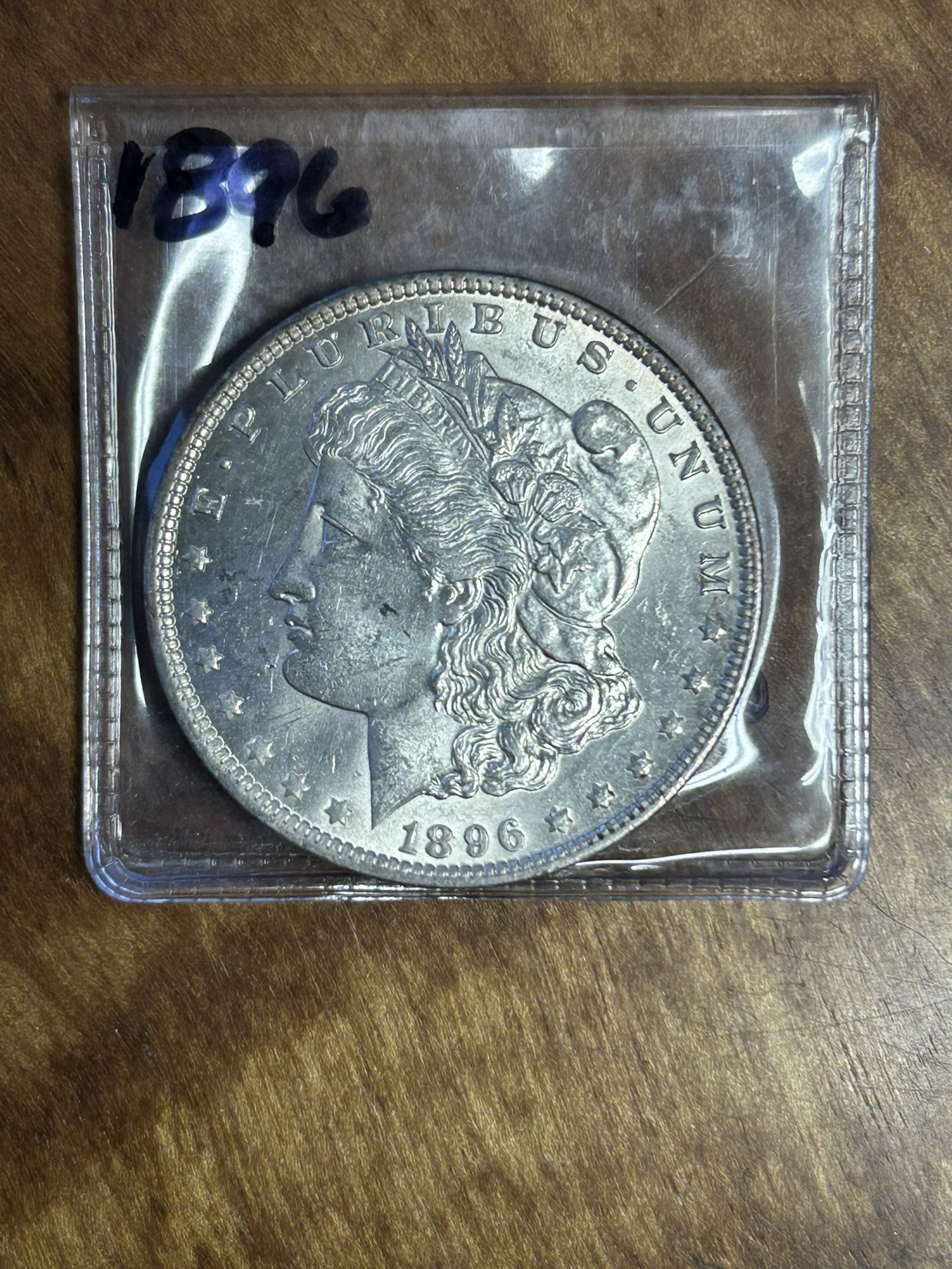 1896 Morgan Silver Dollar. - Toning