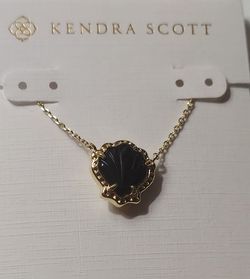 Kendra Scott Brynne Gold Shell Short Pendant Necklace in Golden Obsidian.