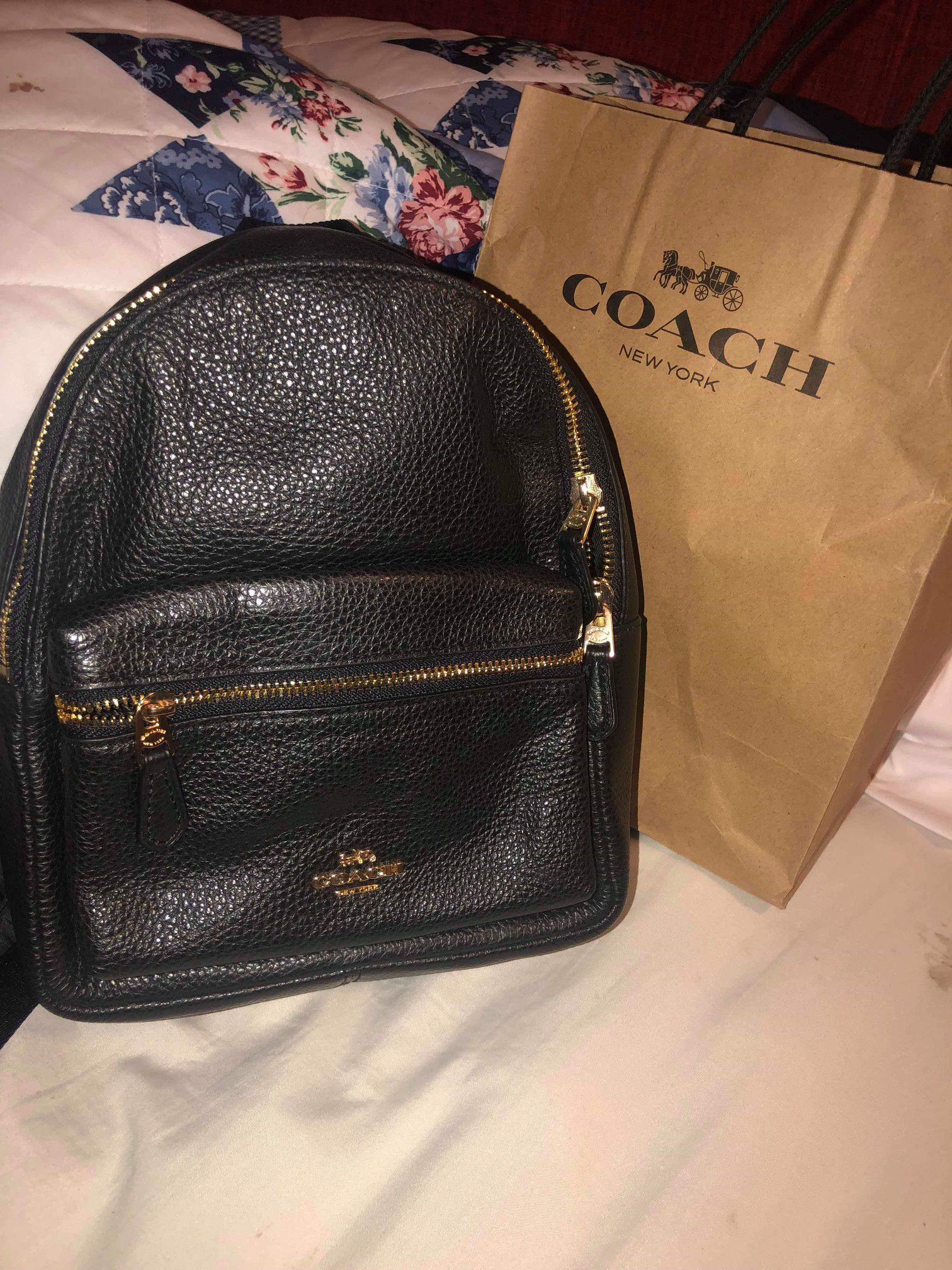 Brand new black leather Coach mini backpack with tags