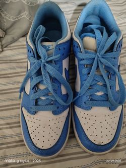 Blue and white nikes