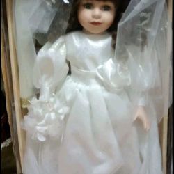Rare Genuine Fine Bisque Porcelain Doll in the Bridal dress Limited edition. 