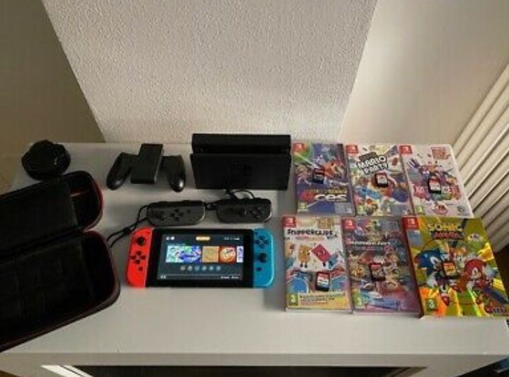 Nintendo Switch V2 64GiG Bundle with Games and Accessories. Call or text my num832 856 8927ber for quick replies.