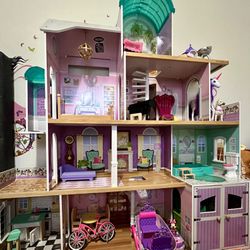 Girls Doll House Almost 5 Ft Tall. Comes With Accessories. 
