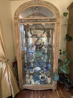Wood carved lighted glass display cabinet