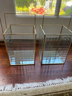Set of two gold faucet, glass lanterns