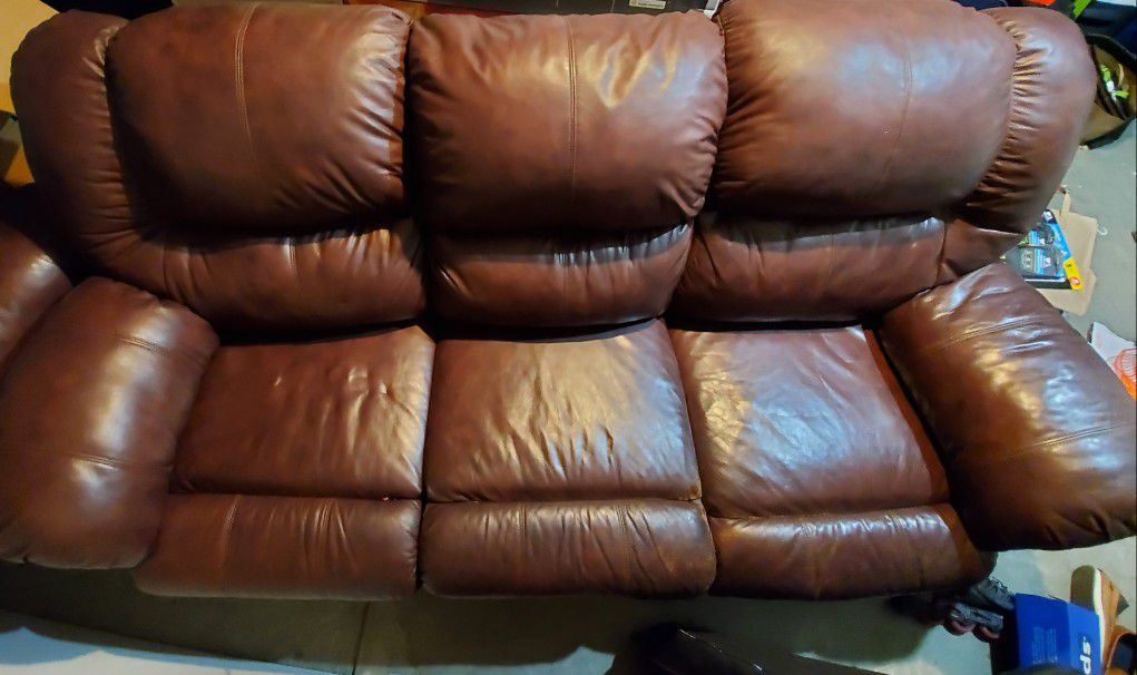 Free leather recliner couch - has wear one seat