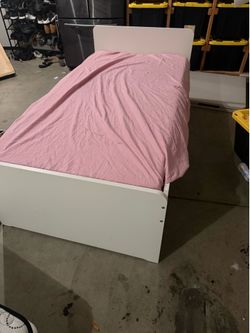 Twin bed with mattress