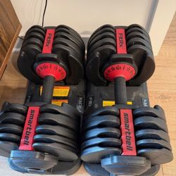 PAIR OF : FitRx = SMARTBELL ADJUSTABLE  DUMBBELLS : 52.5 LBS   ON  EACH  DUMBBELLS 