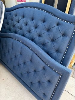Queen upholstered nail head and foot board