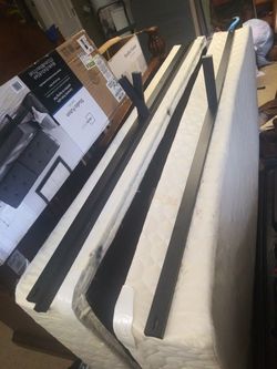 King size new bed rails. And 2 twin box spring make a king size