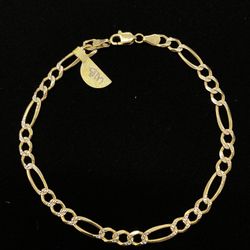 $725 Two Tone Gold Figaro Bracelet