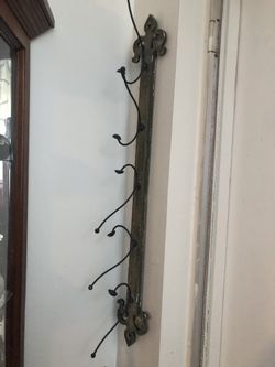 Old hanging clothes rack 2 ft. Long