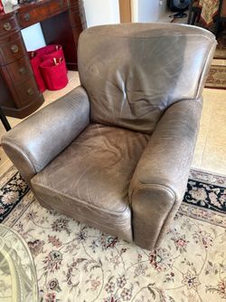 Gray leather seats with Ottoman