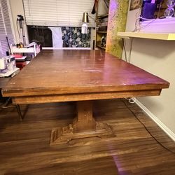 Sturdy wooden dinning table with butterfly foot extension