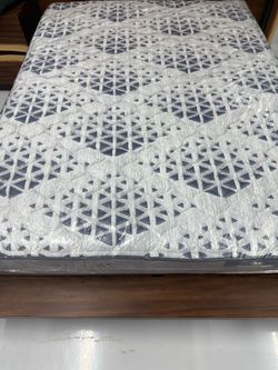 Queen Mattress Still in Plastic Wrap