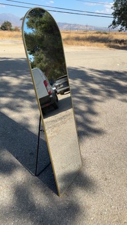 Gold mirror with stand