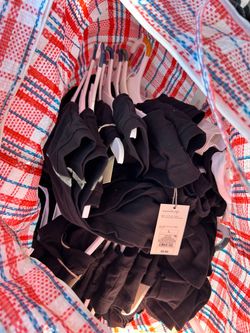 Black Clothing Item different size with Tags