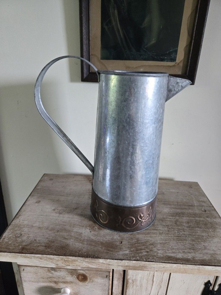 Metal Pitcher With Decorative Base